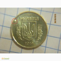 Брак монеты 10 копійок 2014г. - вкрапление + наплыв металла