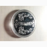 Колекційна монета рік дракона 2024