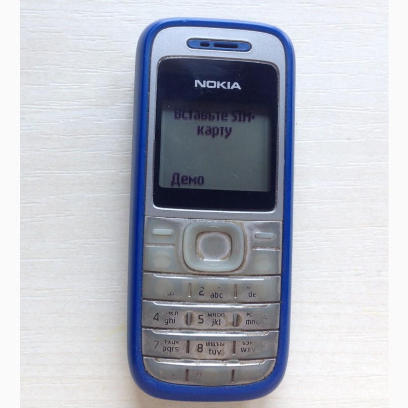 Фото 2. Мобильный телефон Nokia 1200 RH-99 с зарядкой Nokia AC-3E