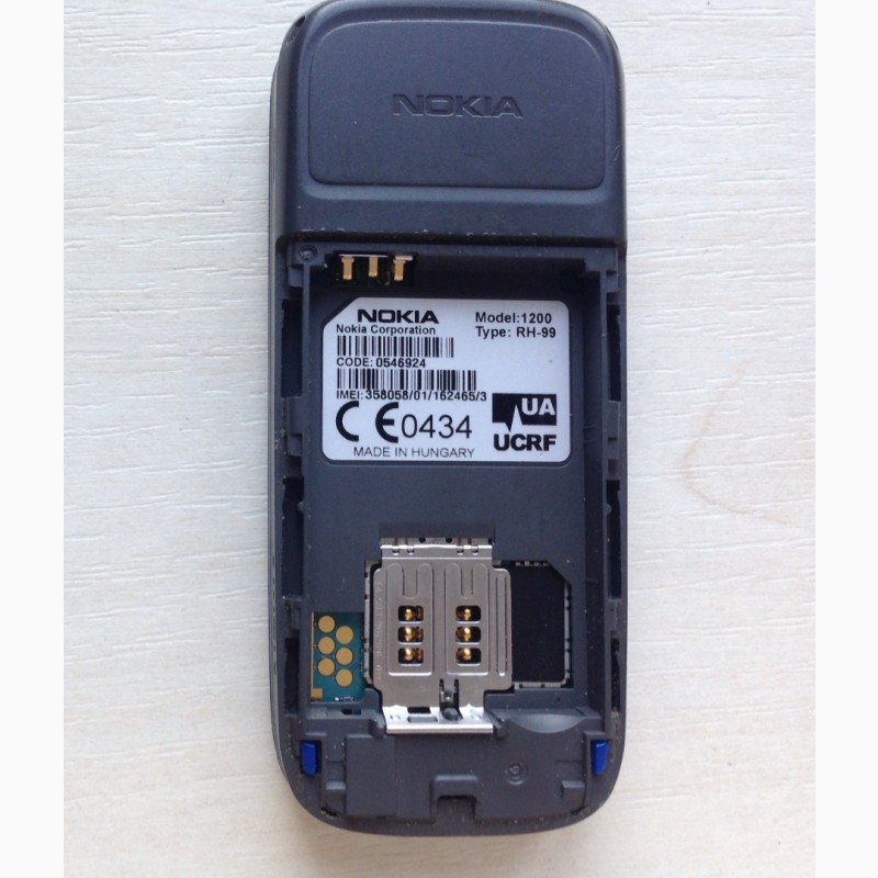 Фото 5. Мобильный телефон Nokia 1200 RH-99 с зарядкой Nokia AC-3E