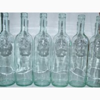 Бутылки производства Италии разного цвета стекла