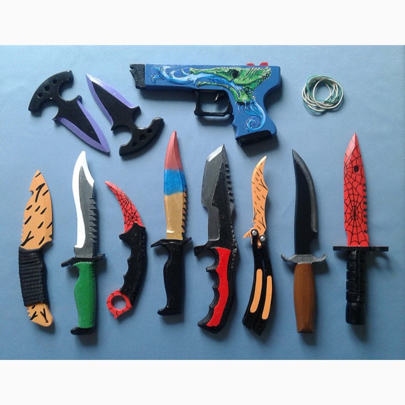 Фото 2. Набор: 10 деревянных ножей и пистолет Глок 18 из популярной игры CS:GO
