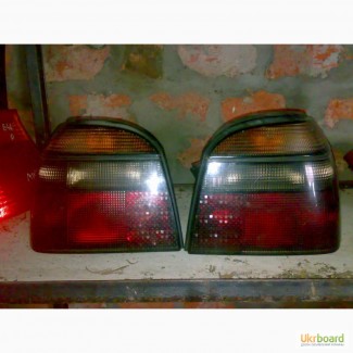 Продам оригинальные фонари Hella Black на VW Golf 3