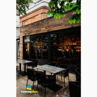 Скління ресторанів та кафе безрамними розсувними системами PanoramGlass