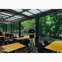 Скління ресторанів та кафе безрамними розсувними системами PanoramGlass