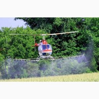 Услуги вертолета - обработка пшеницы от клопа черепашки