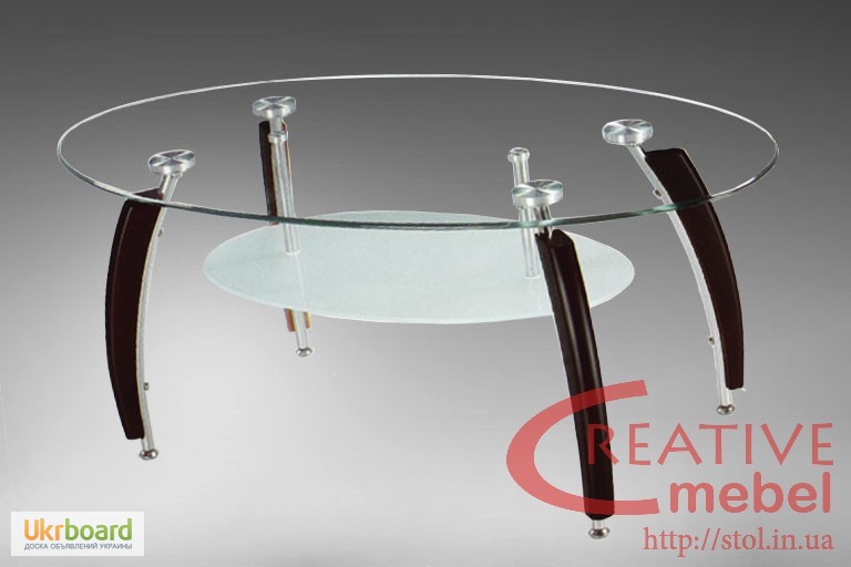 Овальный журнальный стол из стекла