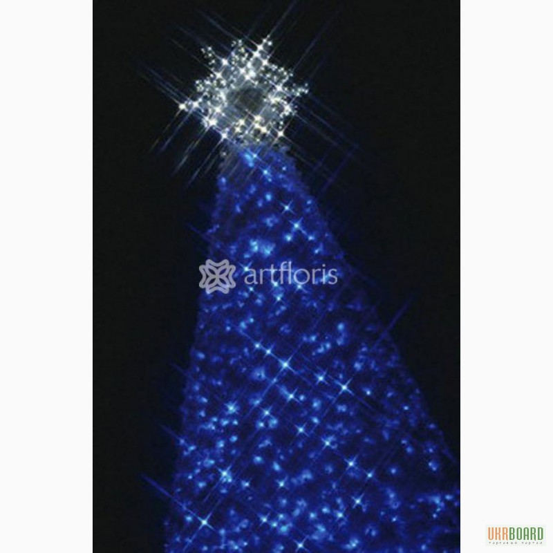 Фото 4. Иллюминация уличных елок, украшение елки гирляндами и мотивами, новогоднее оформление к но