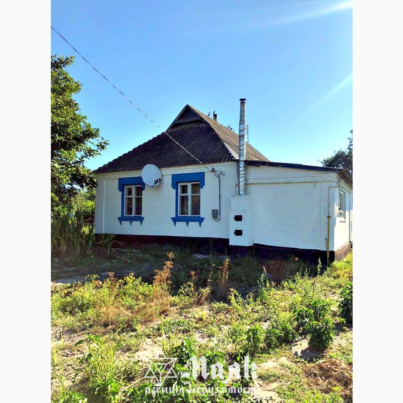 Продам кирпичный дом в центре села Пищики