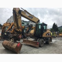 Колесный экскаватор CATERPILLAR M318D