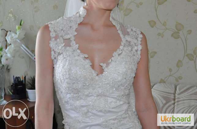 Фото 8. Продам оригинальное свадебное платье с небольшим шлейфом