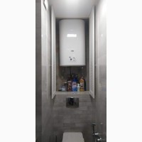 Сантехнический шкаф в туалете
