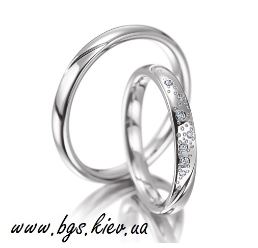 Фото 2. Обручальные кольцо белое золото с бриллиантом
