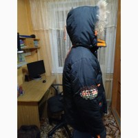 Продам б/у практичную и удобную зимнюю куртку DONILO с капюшоном