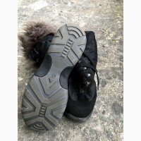 Високі зимові черевики - взуття з хутром